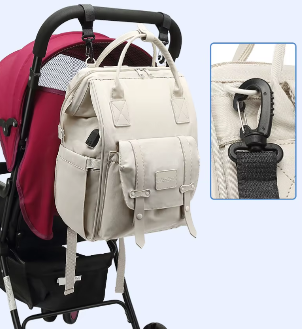 Sac à langer bleu à motifs jaunes, noir et  rose - BabyCarry