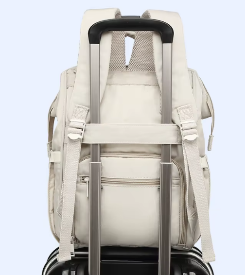 Sac à langer bleu à motifs jaunes, noir et  rose - BabyCarry