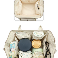 Sac à langer bleu à motifs jaunes, noir et  rose - BabyCarry