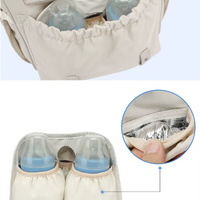 Sac à langer bleu à motifs jaunes, noir et  rose - BabyCarry